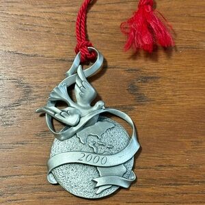 Avon Silver Peaceful Millennium Ornament with Red Cord